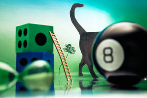 A Horseshoe And Four-leaf Clovers On Wooden Table - Symbols Of Luck. Wallpaper