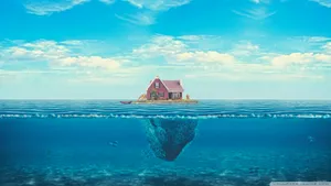 A House Floating In The Ocean With A Blue Sky Wallpaper
