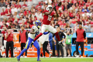 A J Green Catching Football During Game Wallpaper