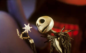 A Jack Skellington Holding A Star Wallpaper