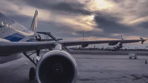 A Jet Airplane On The Tarmac Wallpaper