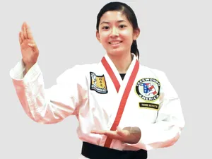 A Karateka Wears A Taekwondo Uniform