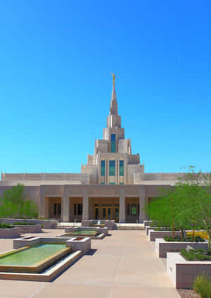 A Large Building With A Fountain Wallpaper