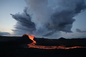 A Lava Flow Is Seen From The Sky Wallpaper
