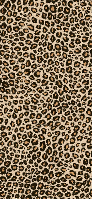 A Leopard Print Fabric With Black And Brown Spots Wallpaper