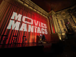 A Lively Evening At The Movie Theater Wallpaper