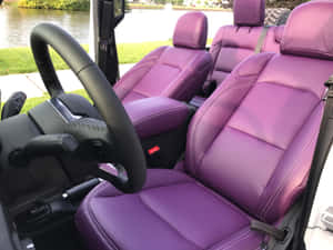 A Luxurious Handbag Made With Premium Purple Leather Wallpaper