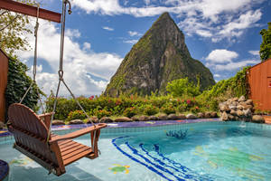 A Luxurious Pool Overlooking The Beautiful Ocean In Saint Lucia, North America Wallpaper