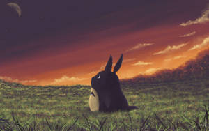 A Magical Sunset In The Field With Totoro Wallpaper