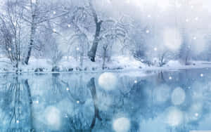 A Magical Winter Landscape Under A Dreamy Snowfall Wallpaper