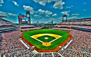 A Magnificent Baseball Stadium Under The Mesmerizing Evening Sky Wallpaper