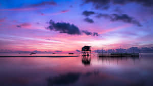 A Magnificent View Of A Rocky Seashore Wallpaper