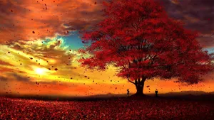 A Majestic Red Tree's Silhouette Illuminated By The Sunrise Wallpaper