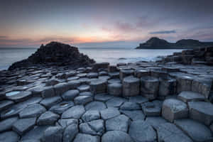 A Majestic View Of Giant's Causeway Rock Formation In Ireland Wallpaper