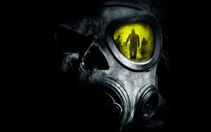 A Man In Distress Wearing A Gas Mask Wallpaper