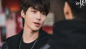 A Man Is Looking At Another Man Wallpaper