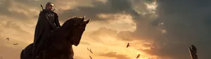 A Man Is Riding A Horse In The Sky Wallpaper