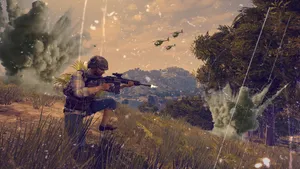 A Man Is Shooting A Gun In The Grass Wallpaper
