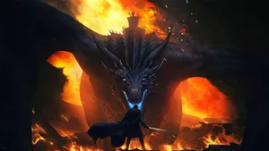 A Man Is Standing In Front Of A Dragon In Flames Wallpaper