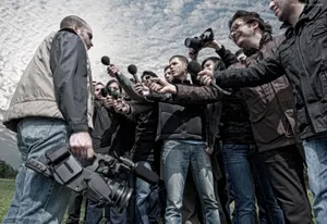 A Man Passionately And Professionally Practicing His Craft - Journalism Wallpaper