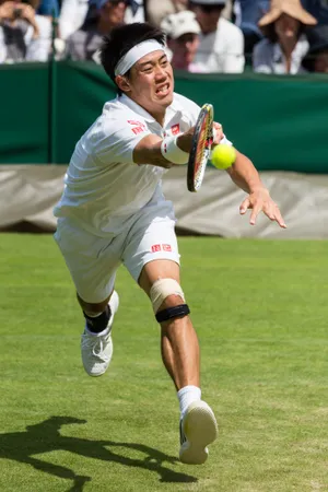 A Man Playing Tennis Wallpaper