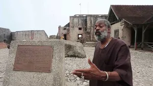 A Man Stands At The Citadelle Laferriere Wallpaper