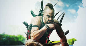 A Man With A Knife In His Hand Is Sitting On A Rock Wallpaper