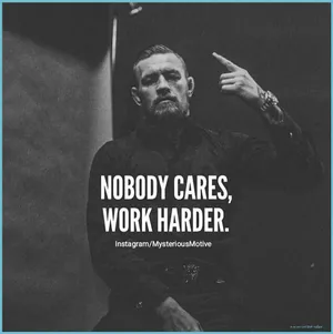 A Man With A Ring On His Hand With The Words Nobody Cares Work Harder Wallpaper