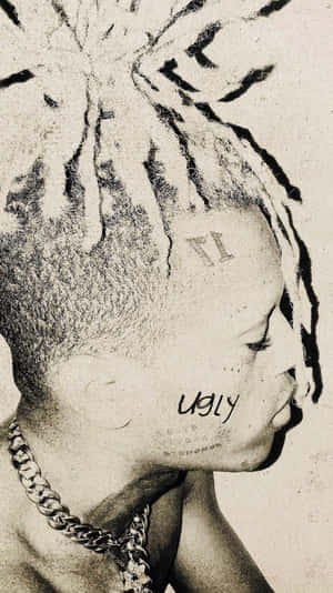 A Man With Dreadlocks On His Head Wallpaper