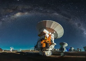 A Massive Radio Telescope Scanning The Night Sky For Cosmic Mysteries Wallpaper