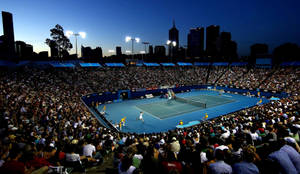 A Mesmerizing Evening At The Australian Open Tennis Court Wallpaper