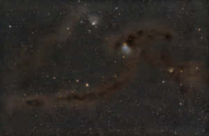 A Mesmerizing Interstellar Cloud In Deep Space Wallpaper