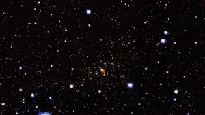 A Mesmerizing View Of A Beautiful Star Illuminating The Night Sky. Wallpaper