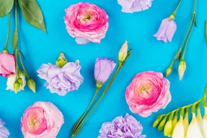 A Mesmerizing View Of A Waterfall Cascading Down A Cliff Wallpaper