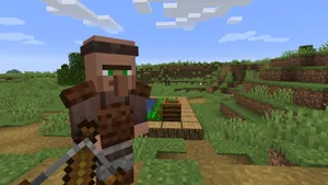 A Minecraft Villager In A Lively Village Landscape Wallpaper