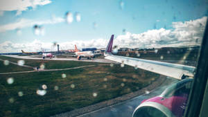 A Misty Plane Window Wallpaper