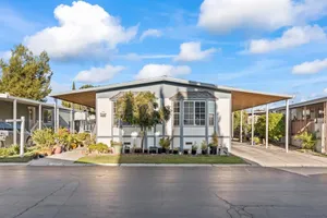 A Mobile Home In A Residential Neighborhood Wallpaper