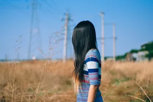 A Model Posing With Her Gorgeous Ombre Hairstyle Wallpaper