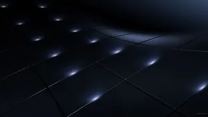 A Modern Desktop Setup With Dual Monitors And Laptop Wallpaper