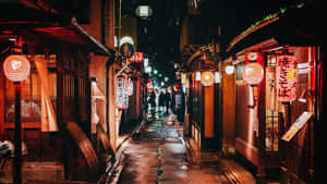 A Narrow Alleyway With A Lot Of Lights Wallpaper