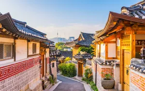 A Narrow Street With A Lot Of Buildings Wallpaper