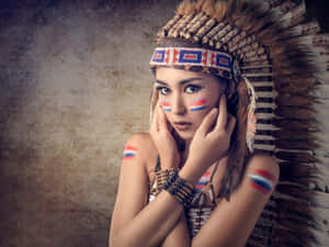 A Native American Indian In Traditional Regalia Wallpaper