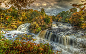 A Natural Autumn Waterfall Wallpaper