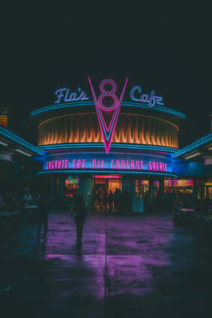 A Neon Sign For The Flint Cafe At Night Wallpaper