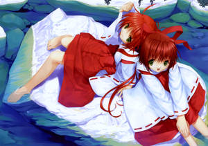 A Pair Of Beautiful Twin Red-haired Anime Girls. Wallpaper