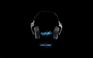 A Pair Of Headphones With The Word Dj On Them Wallpaper