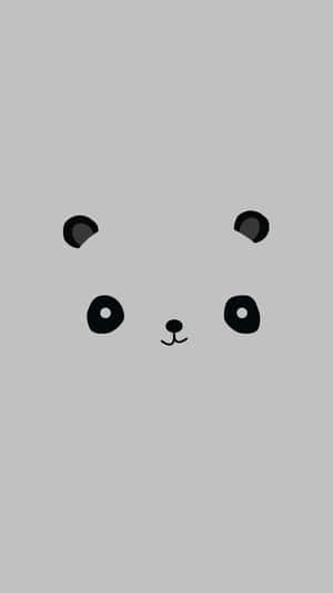 A Panda Bear Face On A Gray Background Wallpaper