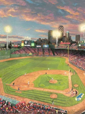 A Panoramic View Of An Illuminated Baseball Stadium Under Cloudy Skies Wallpaper