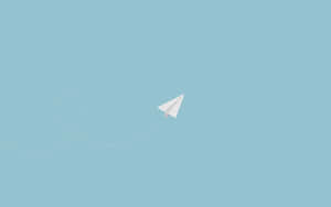 A Paper Airplane Flying In The Sky Wallpaper