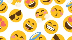 A Pattern Of Emojis With Different Expressions Wallpaper
